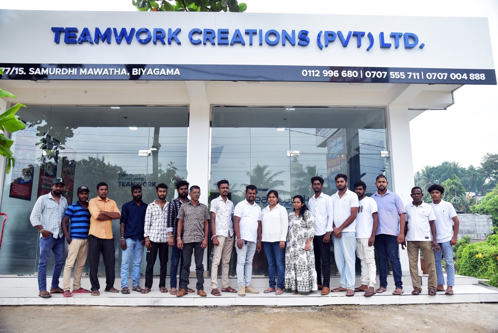 The Teamwork Creations team outside the company office
